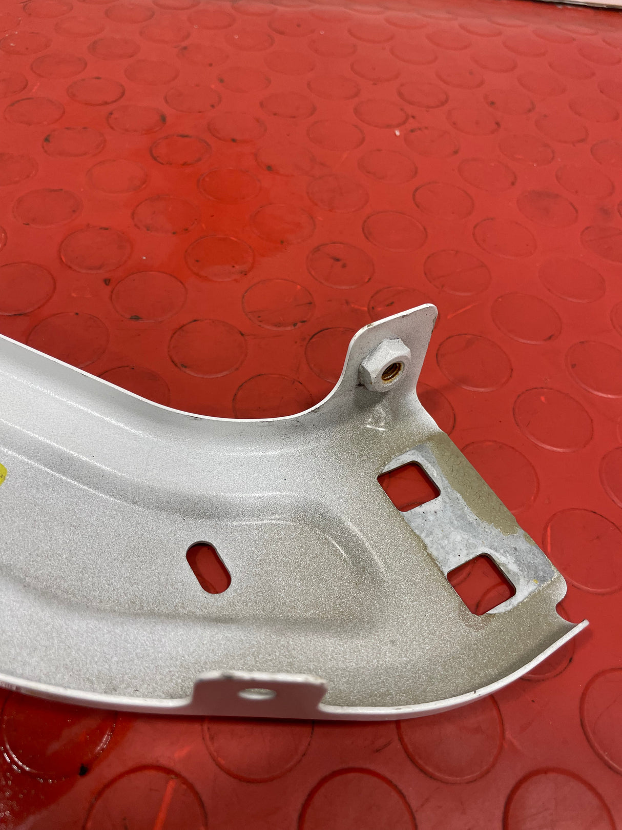 Citroen Berlingo/ Peugeot Partner PASSENGER SIDE UNDER HEADLIGHT BRACKET (WHITE) 2008-2018 P/N 02G